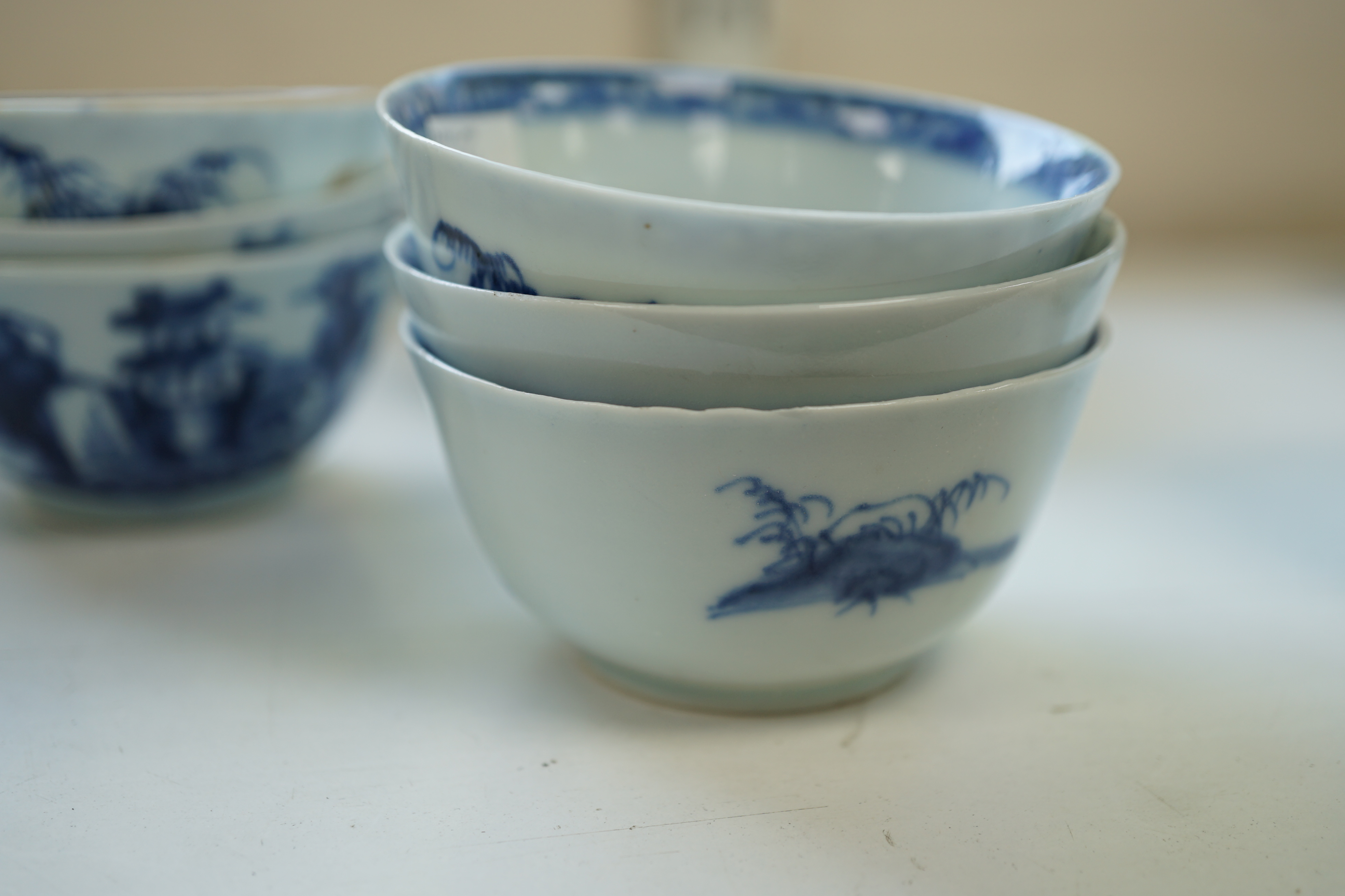 A set of twenty four Chinese Nanking Cargo blue and white ‘large pagoda’ tea bowls and saucers, Qianlong period